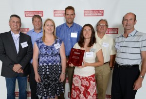 Stoneridge Software employees at the Best Place to Work celebration with their award.