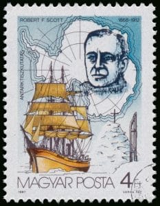 Stamp printed by Hungary, showing a depiction of Robert F Scott and his journey to the South Pole.