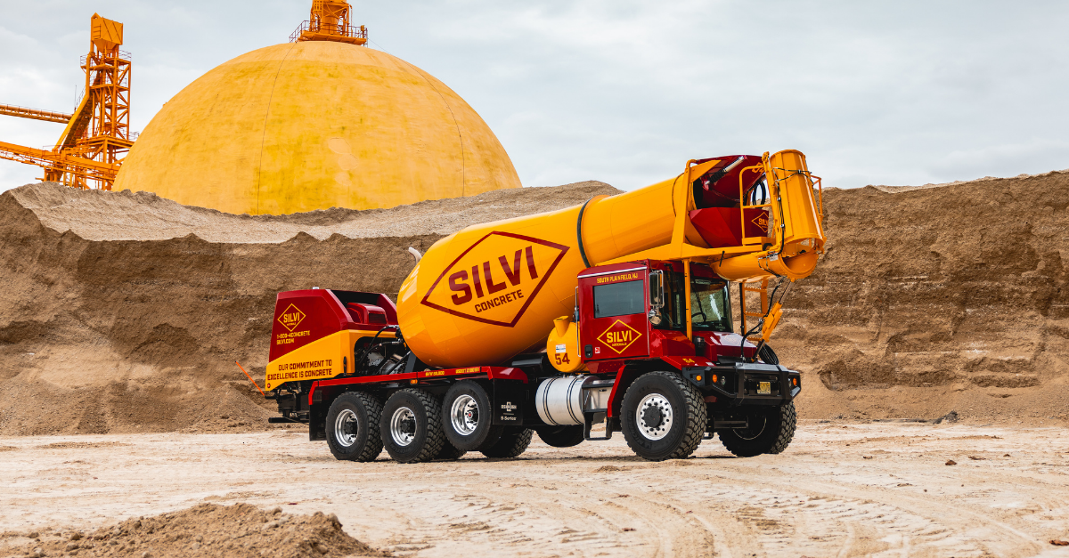 large Silvi truck in a large dirt construction area